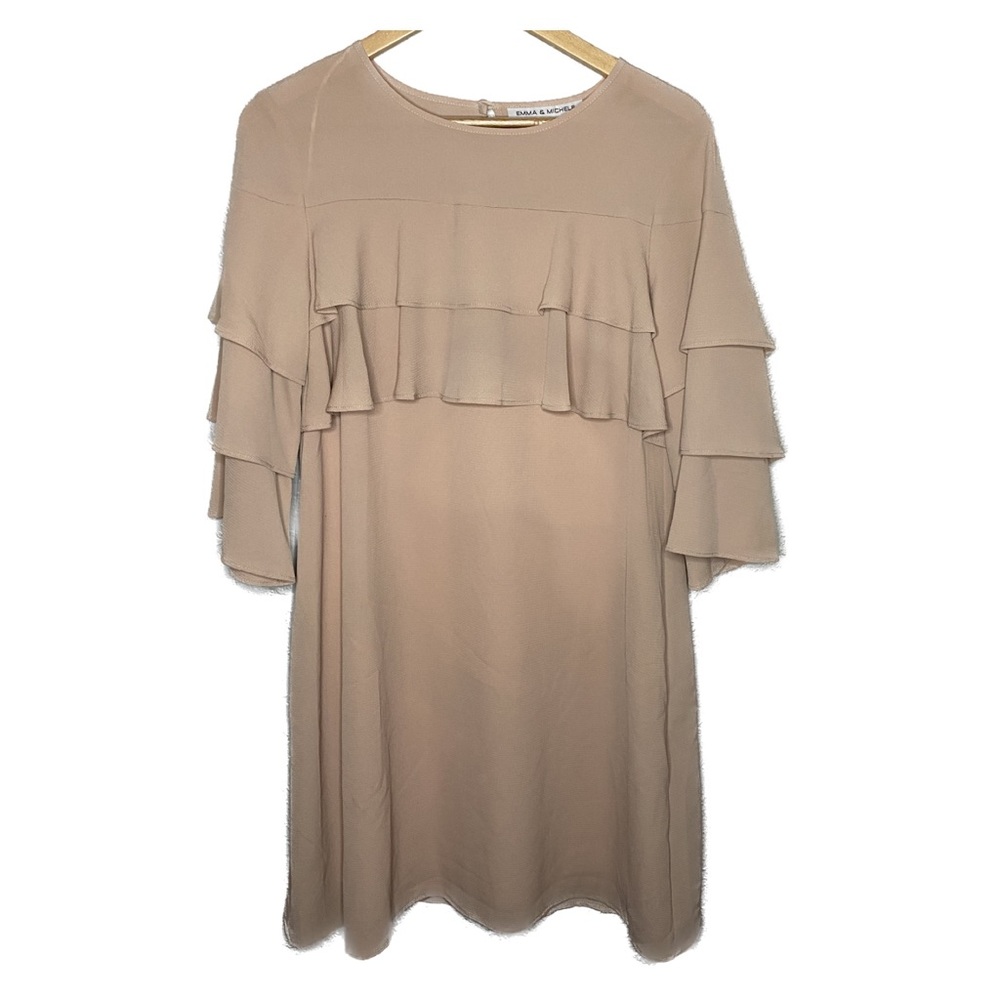 Brand new dress with out tags lined with staves ruffles and 3/4 sleeved